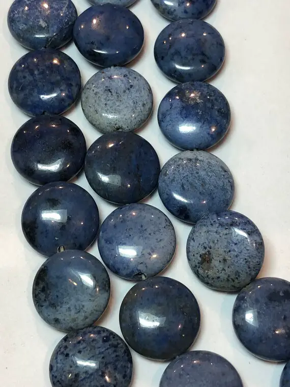 16mm Puff Coin Dumortierite Gemstone Beads. Full 16" Strand Of Light Blue Dumortierite, 27 Beads Per Strand. Beads Vary Slightly In Color.