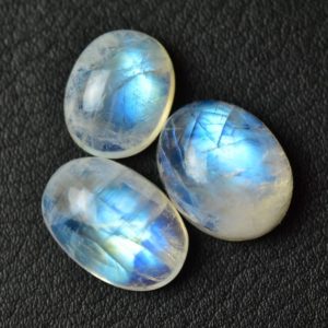 Shop Rainbow Moonstone Cabochons! 3 Pieces Natural AAA Rainbow Moonstone Cabochons 11×13.5mm 12.4×15.7mm Oval Shape White Moonstone Gemstones Loose Stones Smooth Cabs C-1834 | Natural genuine stones & crystals in various shapes & sizes. Buy raw cut, tumbled, or polished gemstones for making jewelry or crystal healing energy vibration raising reiki stones. #crystals #gemstones #crystalhealing #crystalsandgemstones #energyhealing #affiliate #ad