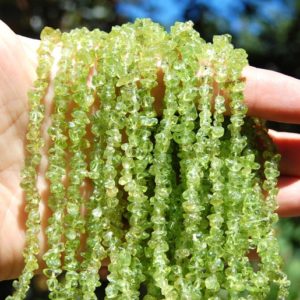 Shop Peridot Chip & Nugget Beads! 5 mm Peridot chip bead strand, Jewelry making supplies, Circle of Stones,  Gemstone beads, Bead strands | Natural genuine chip Peridot beads for beading and jewelry making.  #jewelry #beads #beadedjewelry #diyjewelry #jewelrymaking #beadstore #beading #affiliate #ad