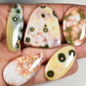 Shop Ocean Jasper Stones & Crystals! 5 OCEAN JASPER cabochons with 5 unique patterns | Natural genuine stones & crystals in various shapes & sizes. Buy raw cut, tumbled, or polished gemstones for making jewelry or crystal healing energy vibration raising reiki stones. #crystals #gemstones #crystalhealing #crystalsandgemstones #energyhealing #affiliate #ad