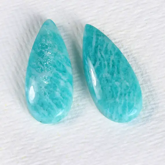 A Pair Of Russian Amazonite Cabochons, 25 X 11mm, 23cts Total Weight