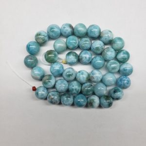 Shop Larimar Round Beads! AA 10.5mm Larimar Round Bead ~this is for ONE bead~ | Natural genuine round Larimar beads for beading and jewelry making.  #jewelry #beads #beadedjewelry #diyjewelry #jewelrymaking #beadstore #beading #affiliate #ad