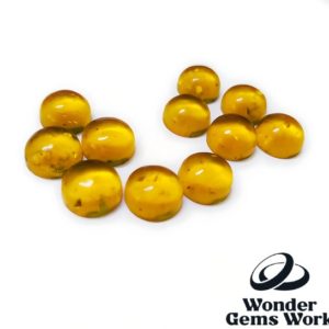 Shop Amber Stones & Crystals! AAA Synthetic Baltic Amber Calibrated 5mm-30mm Round Cab | Natural genuine stones & crystals in various shapes & sizes. Buy raw cut, tumbled, or polished gemstones for making jewelry or crystal healing energy vibration raising reiki stones. #crystals #gemstones #crystalhealing #crystalsandgemstones #energyhealing #affiliate #ad