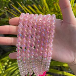 Shop Angel Aura Quartz Beads! Aura Rose Quartz Beads Round, Angel Aura Rose Quartz Crystal Beads, AB Pink Rose Quartz Strands, 6mm, 8mm, 10mm, 15.5''/Str | Natural genuine round Angel Aura Quartz beads for beading and jewelry making.  #jewelry #beads #beadedjewelry #diyjewelry #jewelrymaking #beadstore #beading #affiliate #ad