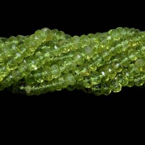 Shop Peridot Rondelle Beads! AAA+ Natural Peridot Faceted Rondelle Beads    5-6MM Peridot Beads    Rondelle Peridot Beads    Faceted Peridot Beads    Peridot Gemstones | Natural genuine rondelle Peridot beads for beading and jewelry making.  #jewelry #beads #beadedjewelry #diyjewelry #jewelrymaking #beadstore #beading #affiliate #ad