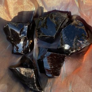 Shop Raw & Rough Obsidian Stones! Black Obsidian Raw Stone | Natural genuine stones & crystals in various shapes & sizes. Buy raw cut, tumbled, or polished gemstones for making jewelry or crystal healing energy vibration raising reiki stones. #crystals #gemstones #crystalhealing #crystalsandgemstones #energyhealing #affiliate #ad