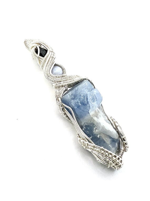 Blue Calcite Gemstone Pendant With Blue Lace Agate And Brookite Wire Wrapped In Fine Silver. Floating Out Of Your Physical Body