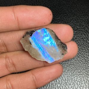 Shop Raw & Rough Rainbow Moonstone Stones! Blue Flashy Rainbow Moonstone Rough Slab With Black Tourmaline Fancy Shape Gemstone Raw Rough Size – 23.50×33.50×6.50 MM For Making Jewelry | Natural genuine stones & crystals in various shapes & sizes. Buy raw cut, tumbled, or polished gemstones for making jewelry or crystal healing energy vibration raising reiki stones. #crystals #gemstones #crystalhealing #crystalsandgemstones #energyhealing #affiliate #ad