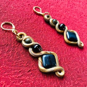 Shop Golden Obsidian Earrings! Blue Tiger's Eye, Smoky Quartz,& Golden Obsidian Twist Earrings | Natural genuine Golden Obsidian earrings. Buy crystal jewelry, handmade handcrafted artisan jewelry for women.  Unique handmade gift ideas. #jewelry #beadedearrings #beadedjewelry #gift #shopping #handmadejewelry #fashion #style #product #earrings #affiliate #ad