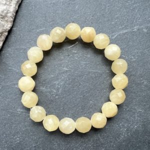 Shop Aragonite Bracelets! Bracelet Aragonite faceted 10 mm, power bracelet for inner harmony | Natural genuine Aragonite bracelets. Buy crystal jewelry, handmade handcrafted artisan jewelry for women.  Unique handmade gift ideas. #jewelry #beadedbracelets #beadedjewelry #gift #shopping #handmadejewelry #fashion #style #product #bracelets #affiliate #ad