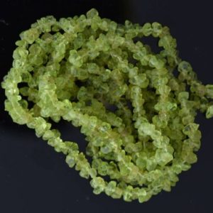 Shop Peridot Chip & Nugget Beads! Chips 5x4mm Genuine Peridot Nugget Beads, 36 inch Strand | Natural genuine chip Peridot beads for beading and jewelry making.  #jewelry #beads #beadedjewelry #diyjewelry #jewelrymaking #beadstore #beading #affiliate #ad