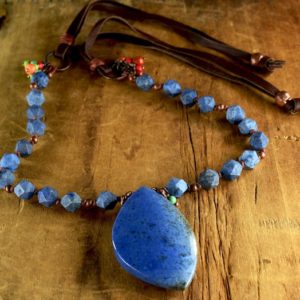 Shop Dumortierite Pendants! Dumortierite Pendant Necklace, Tribal Necklace, Blue, Red, Leather, Southwest Jewelry | Natural genuine Dumortierite pendants. Buy crystal jewelry, handmade handcrafted artisan jewelry for women.  Unique handmade gift ideas. #jewelry #beadedpendants #beadedjewelry #gift #shopping #handmadejewelry #fashion #style #product #pendants #affiliate #ad