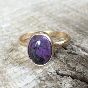 Elegant Minimalist Rare Oval Plum Purple Sugilite Love Gold Ring in 14 Karat Gold | Gold Ring | Sugilite Ring | Gifts for Her | Natural genuine Sugilite jewelry. Buy crystal jewelry, handmade handcrafted artisan jewelry for women.  Unique handmade gift ideas. #jewelry #beadedjewelry #beadedjewelry #gift #shopping #handmadejewelry #fashion #style #product #jewelry #affiliate #ad