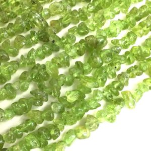 Shop Peridot Chip & Nugget Beads! Gemstone Peridot Chip Bead Green Peridot Chip Nugget Pebble Chip Bead 7-10mm Raw Stone Chip 30" Full inch Strand High Quality Gemstone Beads | Natural genuine chip Peridot beads for beading and jewelry making.  #jewelry #beads #beadedjewelry #diyjewelry #jewelrymaking #beadstore #beading #affiliate #ad