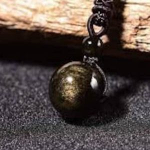 Shop Golden Obsidian Necklaces! Obsidienne doree boule 16 mm | Natural genuine Golden Obsidian necklaces. Buy crystal jewelry, handmade handcrafted artisan jewelry for women.  Unique handmade gift ideas. #jewelry #beadednecklaces #beadedjewelry #gift #shopping #handmadejewelry #fashion #style #product #necklaces #affiliate #ad