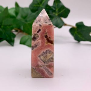 Shop Rhodochrosite Points & Wands! Gorgeous pink rhodochrosite point with beautiful patterns and sparkly druzy! | Natural genuine stones & crystals in various shapes & sizes. Buy raw cut, tumbled, or polished gemstones for making jewelry or crystal healing energy vibration raising reiki stones. #crystals #gemstones #crystalhealing #crystalsandgemstones #energyhealing #affiliate #ad