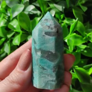 Shop Amazonite Points & Wands! Graphic amazonite tower #E obelisk point wand smoky smokey Quartz | Natural genuine stones & crystals in various shapes & sizes. Buy raw cut, tumbled, or polished gemstones for making jewelry or crystal healing energy vibration raising reiki stones. #crystals #gemstones #crystalhealing #crystalsandgemstones #energyhealing #affiliate #ad