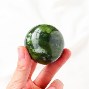 Shop Jade Shapes! Green Jade Sphere Ball Natural Jade Sphere Gemstone Sphere | Natural genuine stones & crystals in various shapes & sizes. Buy raw cut, tumbled, or polished gemstones for making jewelry or crystal healing energy vibration raising reiki stones. #crystals #gemstones #crystalhealing #crystalsandgemstones #energyhealing #affiliate #ad
