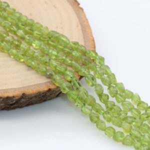 Shop Peridot Chip & Nugget Beads! Green Peridot  Nugget Beads, Gemstone Irregular Loose Beads, Pebble Nugget Beads, Size 6mm #51 | Natural genuine chip Peridot beads for beading and jewelry making.  #jewelry #beads #beadedjewelry #diyjewelry #jewelrymaking #beadstore #beading #affiliate #ad