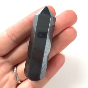 Shop Hematite Stones & Crystals! Hematite polished point wand 55mm | Natural genuine stones & crystals in various shapes & sizes. Buy raw cut, tumbled, or polished gemstones for making jewelry or crystal healing energy vibration raising reiki stones. #crystals #gemstones #crystalhealing #crystalsandgemstones #energyhealing #affiliate #ad
