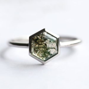 Shop Moss Agate Jewelry! Hexagon Moss Agate Ring Solitaire, Organic gemstone ring, Unique hexagon engagement | Natural genuine Moss Agate jewelry. Buy handcrafted artisan wedding jewelry.  Unique handmade bridal jewelry gift ideas. #jewelry #beadedjewelry #gift #crystaljewelry #shopping #handmadejewelry #wedding #bridal #jewelry #affiliate #ad