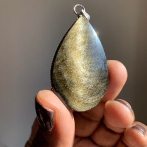 Shop Golden Obsidian Pendants! High Quality Golden Sheen Obsidian Pendant | Gold Sheen | Healing Crystals Stones  | Chakra Stones | Rocks and Minerals | Mexico Mineral | Natural genuine Golden Obsidian pendants. Buy crystal jewelry, handmade handcrafted artisan jewelry for women.  Unique handmade gift ideas. #jewelry #beadedpendants #beadedjewelry #gift #shopping #handmadejewelry #fashion #style #product #pendants #affiliate #ad
