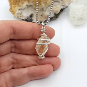 Shop Calcite Necklaces! Honey Calcite Necklace, Silver Wire Wrapped Golden Calcite Pendant | Natural genuine Calcite necklaces. Buy crystal jewelry, handmade handcrafted artisan jewelry for women.  Unique handmade gift ideas. #jewelry #beadednecklaces #beadedjewelry #gift #shopping #handmadejewelry #fashion #style #product #necklaces #affiliate #ad