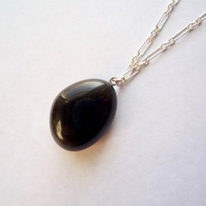 Shop Apache Tears Jewelry! Large obsidian, apache tears necklace on a long, 30 inch, sterling silver chain | Natural genuine Apache Tears jewelry. Buy crystal jewelry, handmade handcrafted artisan jewelry for women.  Unique handmade gift ideas. #jewelry #beadedjewelry #beadedjewelry #gift #shopping #handmadejewelry #fashion #style #product #jewelry #affiliate #ad
