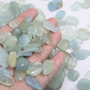 Shop Tumbled Aquamarine Crystals & Pocket Stones! Mix Size & Shape Natural Smooth Tumble Chips Transparent Blue Aquamarine Crystal Best Quality Wholesale Lot Aquamarine Tumble For Jewelry A3 | Natural genuine stones & crystals in various shapes & sizes. Buy raw cut, tumbled, or polished gemstones for making jewelry or crystal healing energy vibration raising reiki stones. #crystals #gemstones #crystalhealing #crystalsandgemstones #energyhealing #affiliate #ad