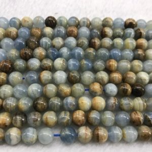 Shop Blue Calcite Jewelry! Lemurian Aquatine Brown Blue Calcite 8mm Round Genuine Gemstone Beads 15 inch Jewelry Supply Bracelet Necklace Material Support Wholesale | Natural genuine Blue Calcite jewelry. Buy crystal jewelry, handmade handcrafted artisan jewelry for women.  Unique handmade gift ideas. #jewelry #beadedjewelry #beadedjewelry #gift #shopping #handmadejewelry #fashion #style #product #jewelry #affiliate #ad