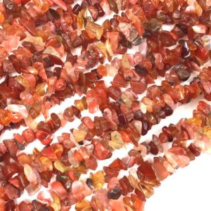 Shop Carnelian Chip & Nugget Beads! Natural Carnelian Chip Bead | Orange Carnelian Nugget Small Pebble Bead 7mm-10mm Chip 30" Full inch Strand High Quality Gemstone Bead | Natural genuine chip Carnelian beads for beading and jewelry making.  #jewelry #beads #beadedjewelry #diyjewelry #jewelrymaking #beadstore #beading #affiliate #ad