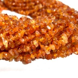 Shop Carnelian Chip & Nugget Beads! Natural Carnelian Uncut Chips Gemstone Beads Carnelian Raw Nuggets Smooth Beads Jewelry Making Beads Carnelian Jewelry Beads Wholesale Beads | Natural genuine chip Carnelian beads for beading and jewelry making.  #jewelry #beads #beadedjewelry #diyjewelry #jewelrymaking #beadstore #beading #affiliate #ad