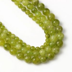 Shop Peridot Round Beads! Natural Green Olivine Peridot Beads 6/8/10mm Round Loose Stone Beads For Jewelry making DIY Charm Bracelets Necklace 15 Inch | Natural genuine round Peridot beads for beading and jewelry making.  #jewelry #beads #beadedjewelry #diyjewelry #jewelrymaking #beadstore #beading #affiliate #ad