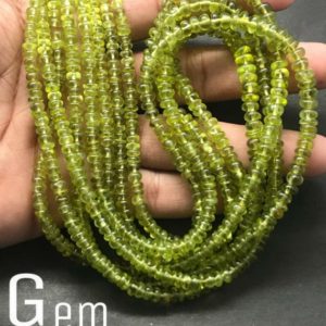 Shop Peridot Rondelle Beads! Natural Peridot Rondelle beads Full strand Smooth hand polish 3.5 – 5.5 MM gradual bead peridot smooth 18 inches strands  rondelle | Natural genuine rondelle Peridot beads for beading and jewelry making.  #jewelry #beads #beadedjewelry #diyjewelry #jewelrymaking #beadstore #beading #affiliate #ad