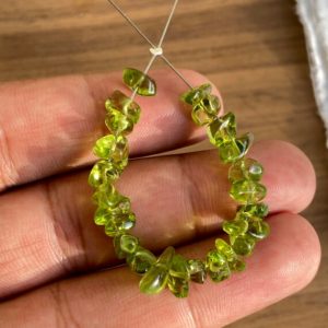 Shop Peridot Chip & Nugget Beads! Natural Peridot Smooth Uncut Nuggets for Jewelry Making Green Natural Gemstone Chips A Grade Peridot Peridot Beads 24 Beads ~ Gemstone Beads | Natural genuine chip Peridot beads for beading and jewelry making.  #jewelry #beads #beadedjewelry #diyjewelry #jewelrymaking #beadstore #beading #affiliate #ad