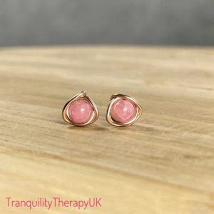 Shop Rhodochrosite Earrings! Natural Pink Rhodochrosite Stud Earrings. Sterling Silver. 14K Gold / Rose Gold Filled. Incl Gift Box Wrapping. Rhodochrosite Earrings. | Natural genuine Rhodochrosite earrings. Buy crystal jewelry, handmade handcrafted artisan jewelry for women.  Unique handmade gift ideas. #jewelry #beadedearrings #beadedjewelry #gift #shopping #handmadejewelry #fashion #style #product #earrings #affiliate #ad