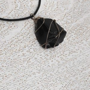 Shop Obsidian Pendants! Natural Raw Black Obsidian Pendant, Healing Crystal Pendant, Gun Metal Wire Wrapped Raw Stone Necklace, Protection Stress Relief, Gemstone | Natural genuine Obsidian pendants. Buy crystal jewelry, handmade handcrafted artisan jewelry for women.  Unique handmade gift ideas. #jewelry #beadedpendants #beadedjewelry #gift #shopping #handmadejewelry #fashion #style #product #pendants #affiliate #ad