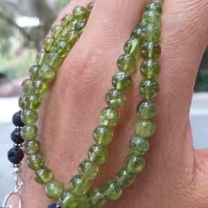Shop Peridot Round Beads! Peridot Round Beads 6.5mm Necklace with Natural Lava and 925 Bali Silver, August Birthstone, Genuine Peridot Bead Necklace Peridot Stone | Natural genuine round Peridot beads for beading and jewelry making.  #jewelry #beads #beadedjewelry #diyjewelry #jewelrymaking #beadstore #beading #affiliate #ad