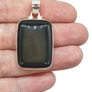 Shop Rainbow Obsidian Pendants! Rainbow Obsidian Pendant, Sterling Silver, Rectangle Shaped, Volcanic Gemstone, Activates Root Chakra, Heals a broken Heart, Offers Support | Natural genuine Rainbow Obsidian pendants. Buy crystal jewelry, handmade handcrafted artisan jewelry for women.  Unique handmade gift ideas. #jewelry #beadedpendants #beadedjewelry #gift #shopping #handmadejewelry #fashion #style #product #pendants #affiliate #ad