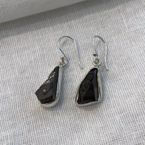Shop Black Tourmaline Earrings! Raw Black Tourmaline Earrings, Sterling Silver Earrings, Gemstone Earrings, Black Tourmaline, Crystal Earrings | Natural genuine Black Tourmaline earrings. Buy crystal jewelry, handmade handcrafted artisan jewelry for women.  Unique handmade gift ideas. #jewelry #beadedearrings #beadedjewelry #gift #shopping #handmadejewelry #fashion #style #product #earrings #affiliate #ad