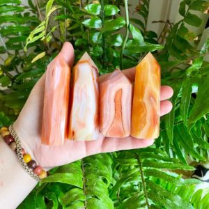 Shop Carnelian Points & Wands! Red, Orange & Salmon Pink Banded Carnelian Tower Wand Point | Natural genuine stones & crystals in various shapes & sizes. Buy raw cut, tumbled, or polished gemstones for making jewelry or crystal healing energy vibration raising reiki stones. #crystals #gemstones #crystalhealing #crystalsandgemstones #energyhealing #affiliate #ad