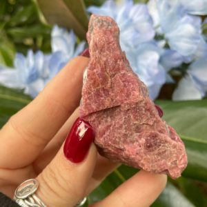 Shop Raw & Rough Rhodonite Stones! Rhodonite, Rhodonite Raw | Natural genuine stones & crystals in various shapes & sizes. Buy raw cut, tumbled, or polished gemstones for making jewelry or crystal healing energy vibration raising reiki stones. #crystals #gemstones #crystalhealing #crystalsandgemstones #energyhealing #affiliate #ad