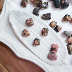 Shop Tumbled Rhodonite Crystals & Pocket Stones! Rhodonite Raw Tumble | Natural genuine stones & crystals in various shapes & sizes. Buy raw cut, tumbled, or polished gemstones for making jewelry or crystal healing energy vibration raising reiki stones. #crystals #gemstones #crystalhealing #crystalsandgemstones #energyhealing #affiliate #ad