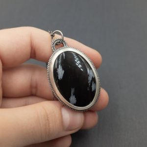 Shop Snowflake Obsidian Pendants! Snowflake Obsidian Pendant in Sterling Silver • Statement Jewelry Piece | Natural genuine Snowflake Obsidian pendants. Buy crystal jewelry, handmade handcrafted artisan jewelry for women.  Unique handmade gift ideas. #jewelry #beadedpendants #beadedjewelry #gift #shopping #handmadejewelry #fashion #style #product #pendants #affiliate #ad