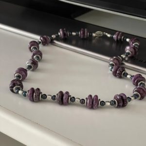 Shop Sugilite Necklaces! Handcrafted Sugilite Rondelle Beads with Black Pearls and Silver Spacers | Elegant Sugilite Beaded Necklace with Black Pearls and Silver | Natural genuine Sugilite necklaces. Buy crystal jewelry, handmade handcrafted artisan jewelry for women.  Unique handmade gift ideas. #jewelry #beadednecklaces #beadedjewelry #gift #shopping #handmadejewelry #fashion #style #product #necklaces #affiliate #ad