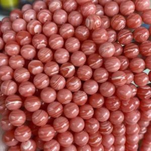 Shop Rhodochrosite Round Beads! Synthetic Rhodochrosite Beads,Round Smooth beads 4-10mm Gemstone Round Loose Beads 15"strand Jewelry Suppliers | Natural genuine round Rhodochrosite beads for beading and jewelry making.  #jewelry #beads #beadedjewelry #diyjewelry #jewelrymaking #beadstore #beading #affiliate #ad
