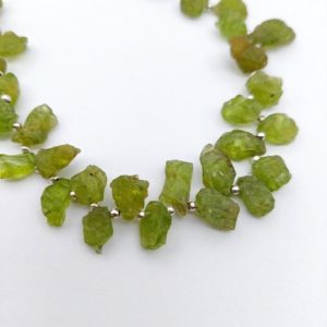 Shop Peridot Chip & Nugget Beads! Top Drilled Natural Raw Peridot Beads, Peridot Nugget Beads, Peridot Chunk Raw Crystal, Top Drilled Beads | Natural genuine chip Peridot beads for beading and jewelry making.  #jewelry #beads #beadedjewelry #diyjewelry #jewelrymaking #beadstore #beading #affiliate #ad