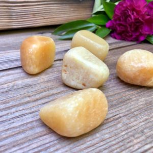 Shop Tumbled Aragonite Crystals & Pocket Stones! Yellow Aragonite Tumbled Stone | Natural genuine stones & crystals in various shapes & sizes. Buy raw cut, tumbled, or polished gemstones for making jewelry or crystal healing energy vibration raising reiki stones. #crystals #gemstones #crystalhealing #crystalsandgemstones #energyhealing #affiliate #ad