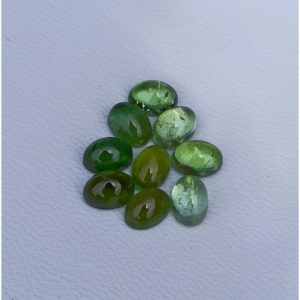 Shop Green Tourmaline Stones & Crystals! AAA Green Tourmaline cabochon Oval Shape 7mm×5mm Size  Natural and Excellent making Loose Gemstone | Natural genuine stones & crystals in various shapes & sizes. Buy raw cut, tumbled, or polished gemstones for making jewelry or crystal healing energy vibration raising reiki stones. #crystals #gemstones #crystalhealing #crystalsandgemstones #energyhealing #affiliate #ad