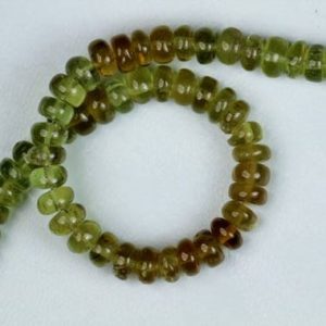 Shop Apatite Rondelle Beads! Awesome, 7 inch long strand Smooth Multi Green APATITE rondelle beads, 6 — 8 mm | Natural genuine rondelle Apatite beads for beading and jewelry making.  #jewelry #beads #beadedjewelry #diyjewelry #jewelrymaking #beadstore #beading #affiliate #ad